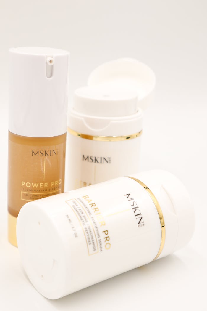 Elegant skincare bottles featuring premium serums and creams in a minimal setup.
